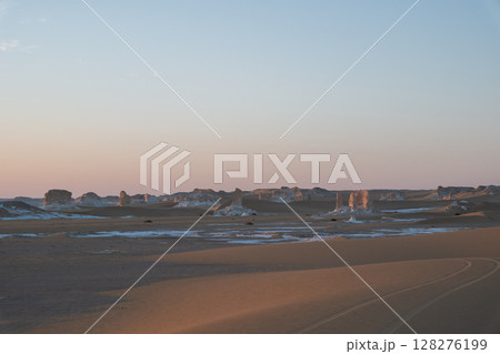 White rock formations and sand dunes in Egypt's White Desert, natural desert landscape White rock formations and sand dunes in Egypt's White Desert, natural desert landscape 128276199