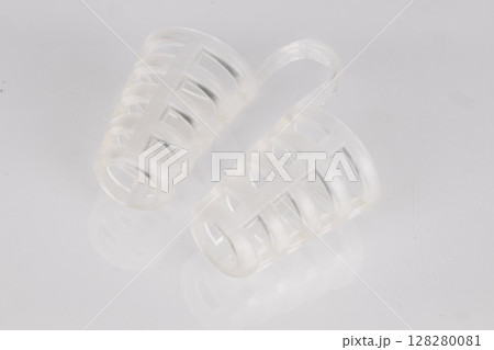 Transparent Silicone Nasal Inserts on White Background Transparent Silicone Nasal Inserts on White Background 128280081