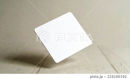 Minimalist white square object floating in midair against a neutral background with soft shadows creating visual contrast and emphasizing simplicity and modern design 128280192