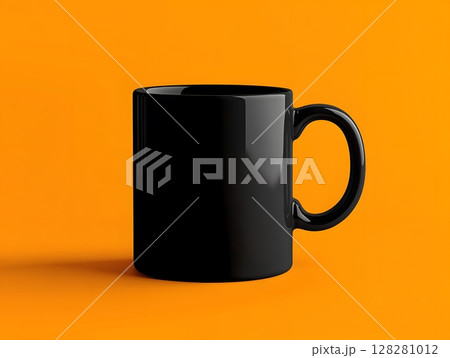 A black ceramic mug with minimalist elegant design placed on orange background	 128281012