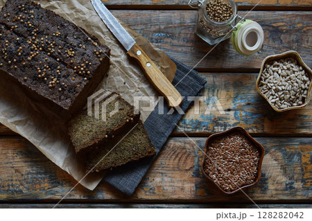 Apple bread loaf from sunflower seeds, chia and flax seeds. Homemade baking. Paleo diet. Organic healthy vegetarian food. Gluten free. Dairy free. Grain free 128282042