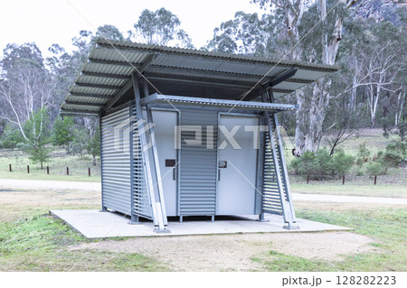 A reasonably well maintained unisex toilet block in a large campground 128282223