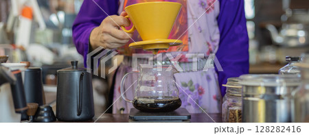 Process drip coffee, Barista start chose coffee bean and Roasting.  128282416