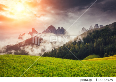 The Funes valley, Santa Maddalena in the National park Puez Odle. Dolomites, South Tyrol. Location Bolzano, Italy alps, Europe. The Funes valley, Santa Maddalena in the National park Puez Odle. Dolomites, South Tyrol. Location Bolzano, Italy alps, Europe. 128282529
