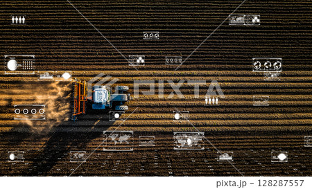 日没時の自動収穫、デジタル農業ネットワーク効果で輝く小麦畑、持続可能なアグリテック 128287557