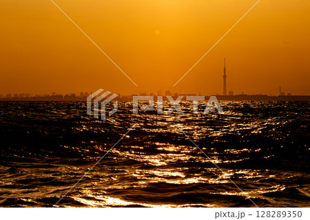Tokyo city and Skytree tower at sunset from the ocean view 128289350