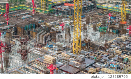 July 6 2025 Large Construction Site with Steel Scaffolding and Tower Cranes 128289796