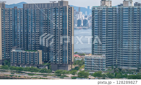 July 6 2025 Modern High-Rise Residential Towers with Urban Waterfront Views July 6 2025 Modern High-Rise Residential Towers with Urban Waterfront Views 128289827