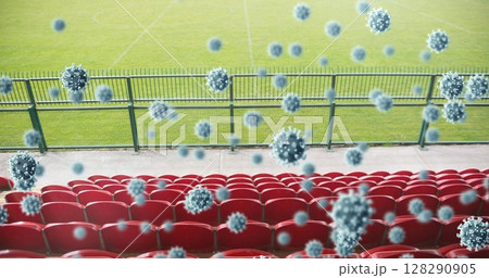 Image of coronavirus cells floating over empty stadium 128290905