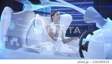 Image of woman wearing white in car in autopilot mode driving across modern city 128290910