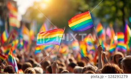 Vibrant gay pride event celebrates diversity with enthusiastic crowd waving rainbow flags Vibrant gay pride event celebrates diversity with enthusiastic crowd waving rainbow flags 128291279