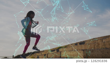 Image of multiple shapes floating over woman jogging on promenade by the sea Image of multiple shapes floating over woman jogging on promenade by the sea 128291836