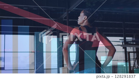 Image of statistics and graphs over woman exercising in an abandoned building Image of statistics and graphs over woman exercising in an abandoned building 128291837