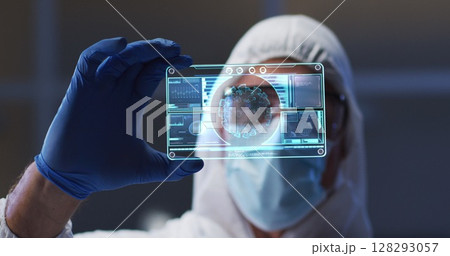 Image of male scientist holding interactive screen with medical data processing Image of male scientist holding interactive screen with medical data processing 128293057