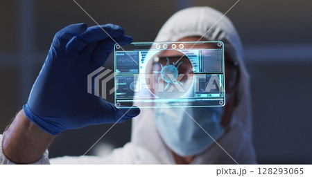 Image of male scientist holding digital screen with covid 19 cell Image of male scientist holding digital screen with covid 19 cell 128293065