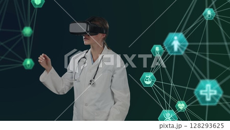 Doctor using VR headset interacting with digital medical interfaces in virtual space 128293625
