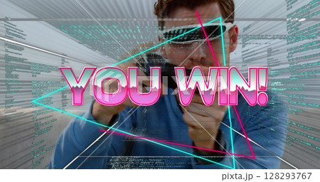 You win! on game interface and data processing over a man wearing vr glasses and using a controller You win! on game interface and data processing over a man wearing vr glasses and using a controller 128293767