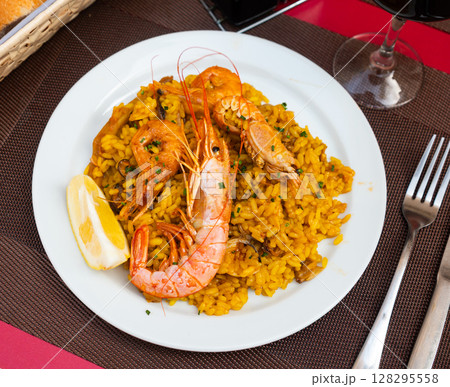 Traditional Mediterranean dish - seafood paella Traditional Mediterranean dish - seafood paella 128295558