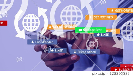 Image of social media text on banners with digital icons over businessman using smartphone Image of social media text on banners with digital icons over businessman using smartphone 128295585