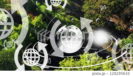 Image of globe icons with arrows and globe spinning over landscape Image of globe icons with arrows and globe spinning over landscape 128295610
