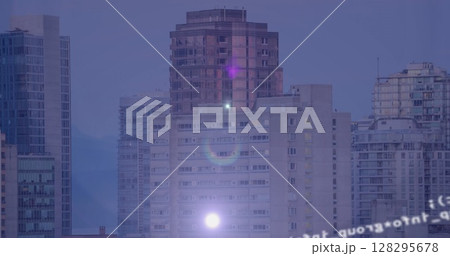 Image of data processing over cityscape on blue background 128295678