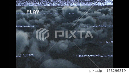 Vintage VHS effect with static clouds creating nostalgic retro atmosphere Vintage VHS effect with static clouds creating nostalgic retro atmosphere 128296219