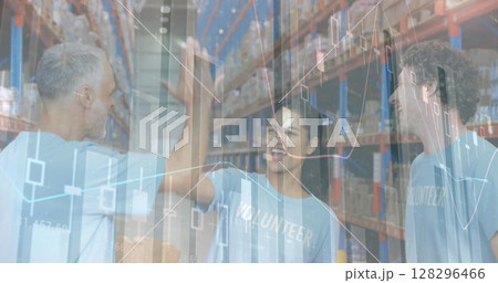 Statistical data processing against male and female volunteers high fiving each other at warehouse Statistical data processing against male and female volunteers high fiving each other at warehouse 128296466