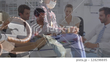 In crowded area, asian woman using smartphone, wearing mask for protection over business people In crowded area, asian woman using smartphone, wearing mask for protection over business people 128296695