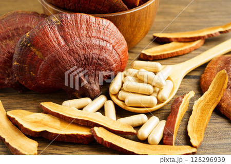 Lingzhi or Reishi mushroom with capsules, organic natural healthy food. 128296939