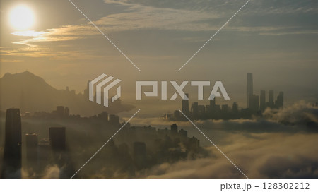 March 2 2025 Captivating Urban Skyline Shrouded in Morning Mist During Sunset March 2 2025 Captivating Urban Skyline Shrouded in Morning Mist During Sunset 128302212
