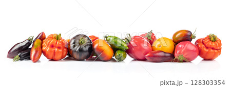 Different tomatoes isolated on white background. Different tomatoes isolated on white background. 128303354