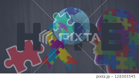 Image of colourful puzzle pieces, globe and hope text 128303545
