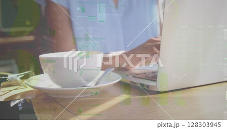 Image of statistics and data processing over businesswoman using laptop Image of statistics and data processing over businesswoman using laptop 128303945