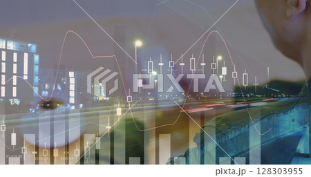 Image of statistics and data processing over cityscape and businessman using smartphone 128303955