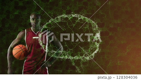 Image of digital brain spinning over male basketball player holding ball 128304036