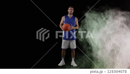 Image of colourful powders over basketball player 128304078