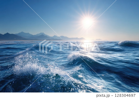 Realistic photo of the sea surface with a blue color and smooth waves, with the sun rising Realistic photo of the sea surface with a blue color and smooth waves, with the sun rising 128304697