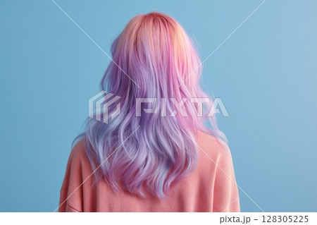 Woman with pastel purple and orange hair 128305225
