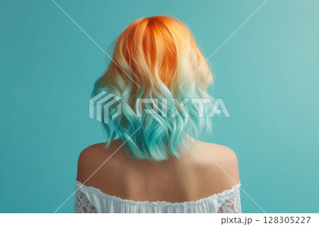 Woman with pastel purple and orange hair Woman with pastel purple and orange hair 128305227