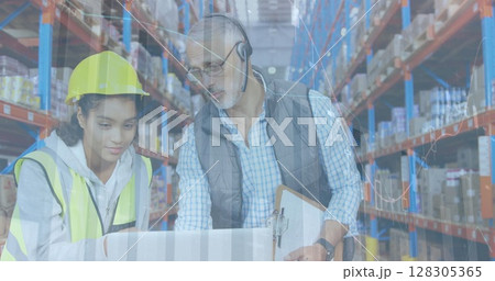 Image of statistics financial data processing over man and woman working in warehouse 128305365