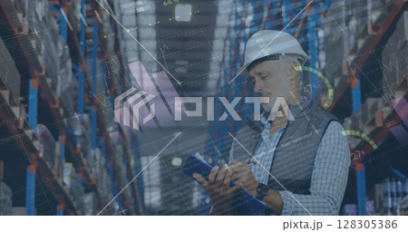 Image of statistics and financial data processing over man working in warehouse Image of statistics and financial data processing over man working in warehouse 128305386