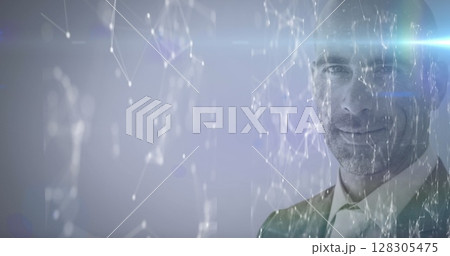 Image of network of connections over man looking at camera Image of network of connections over man looking at camera 128305475