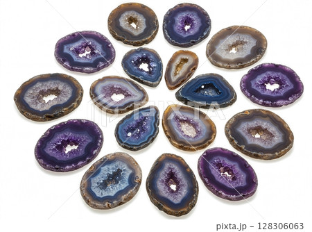 Colorful Amethyst and Agate Geode Slices Collection with Crystal Formations on White Background  128306063
