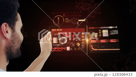 Using futuristic digital tablet, man exploring virtual interface in office 128306433