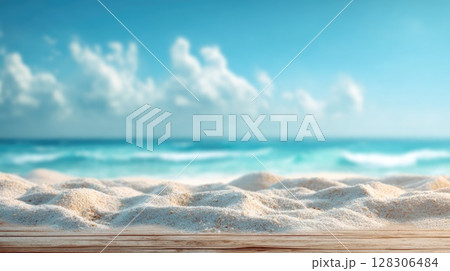 Beautiful summer background with sand and blue sky. Blurred beach scene with copy space 128306484