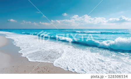 Beautiful summer background with sand and blue sky. Blurred beach scene with copy space 128306534