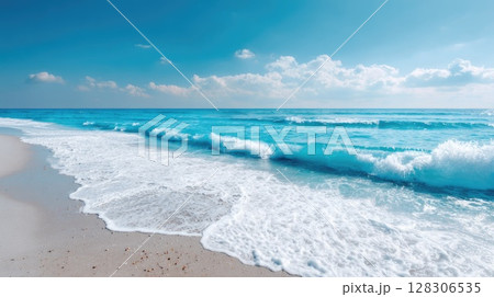 Beautiful summer background with sand and blue sky. Blurred beach scene with copy space 128306535