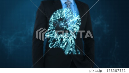 Businessman in suit with digital circuit overlay, representing artificial intelligence 128307531