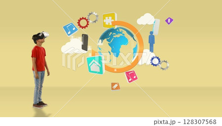 Boy using VR headset exploring digital world...の写真素材 [128307568] - PIXTA