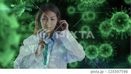 Asian female doctor using stethoscope surrounded by digital virus illustrations Asian female doctor using stethoscope surrounded by digital virus illustrations 128307598